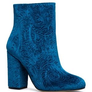 Blue Boot never been worn.  3.5 Heel